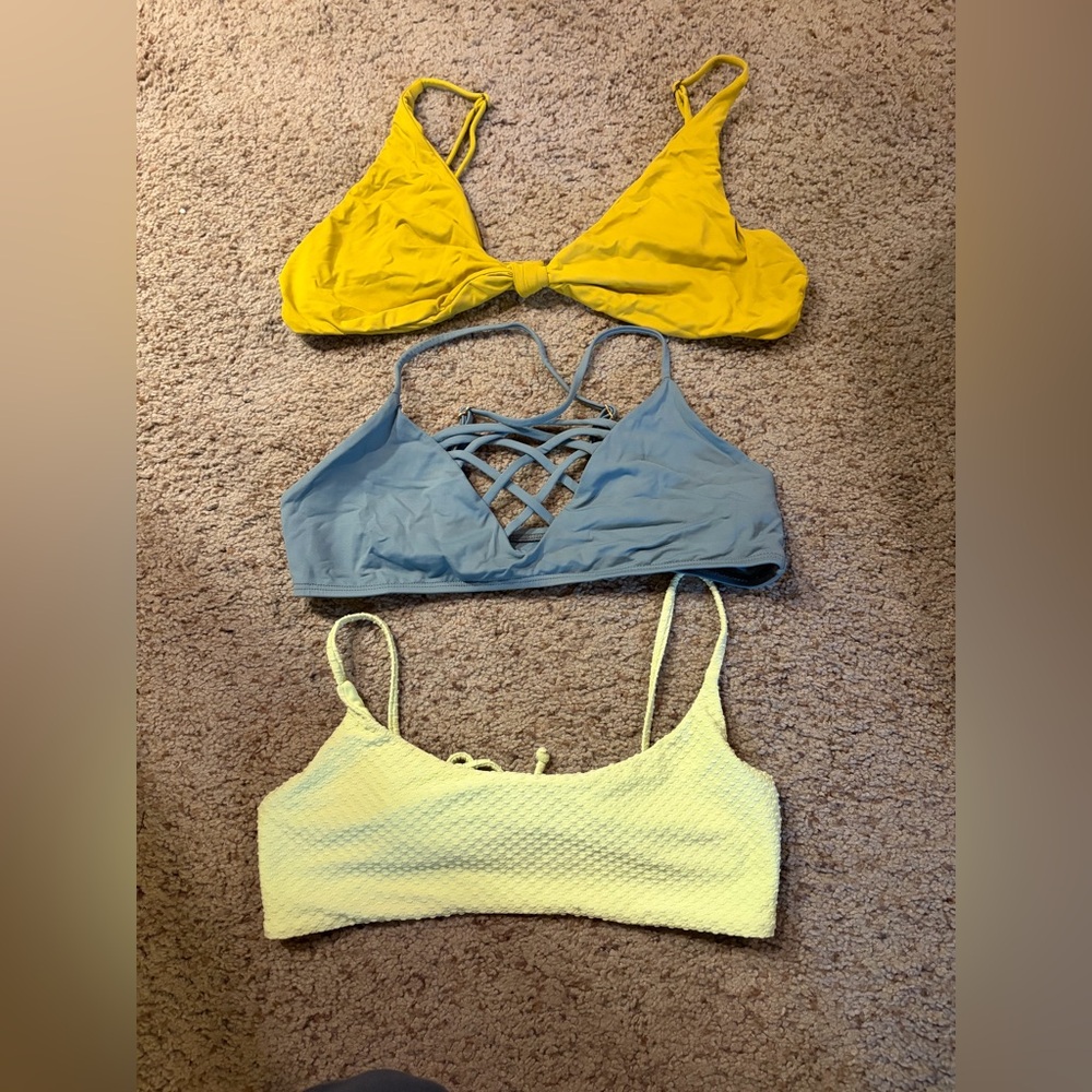 O’Neill swim tops - great condition.